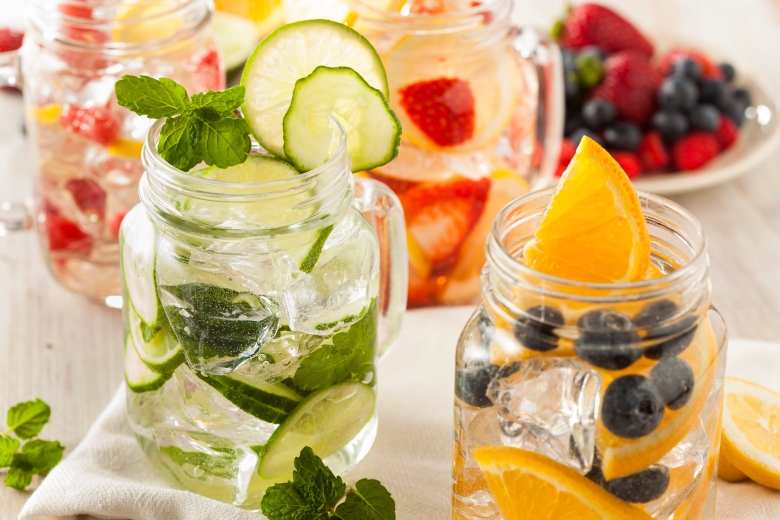 Healthy Spa Water with Fruit on a Background